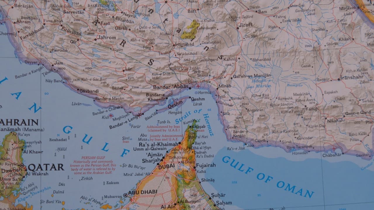 Printed map of the Strait of Hormuz between Iran and the Arabian Peninsula, connecting the Persian Gulf to the Gulf of Oman.